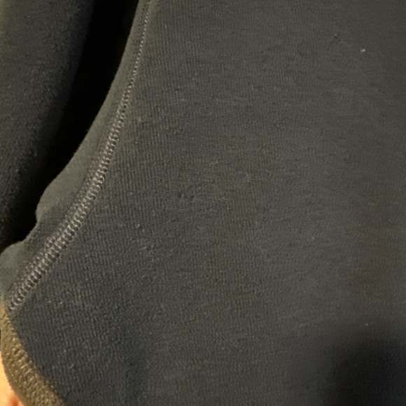 The North Face Navy Blue Fleece with Teal Accent Pocket and Dark Gray Side Panel - Picture 6 of 9